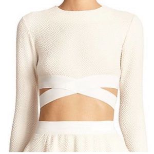 Elizabeth and James cropped ivory sweater with cut outs and zip up back. Size M